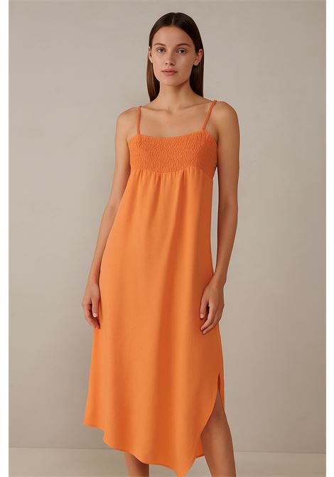 Nekane long dress in lightweight orange fabric, ruched stretch bodice, V-neck and thin braided straps, with fluid asymmetric hemline. Nekane |  | UKUMARIORANGE